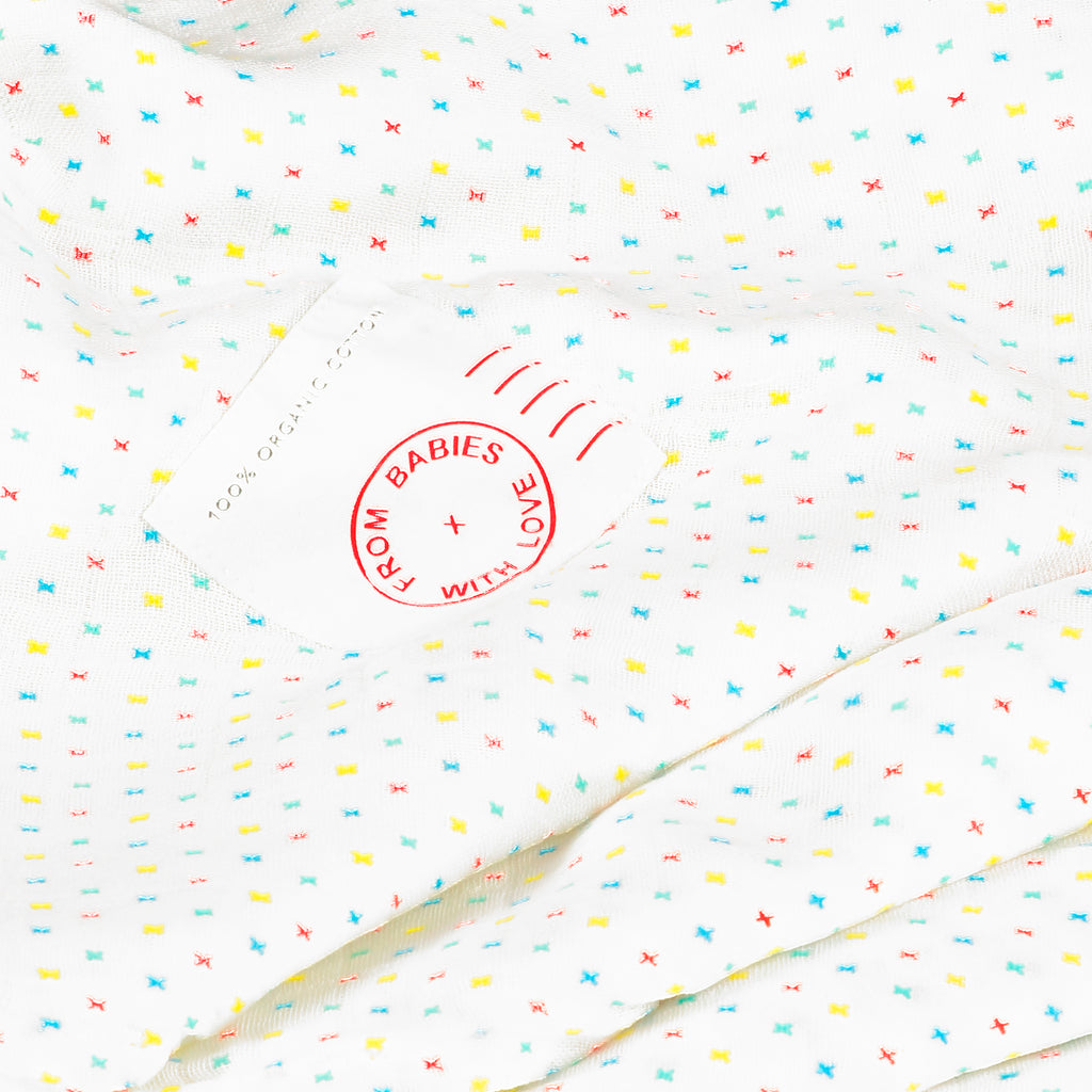 First Kisses Muslin Swaddle Made From 100% Organic Cotton. Free Drawstring Gift Bag and Greetings Card with All Profits To Abandoned Children.