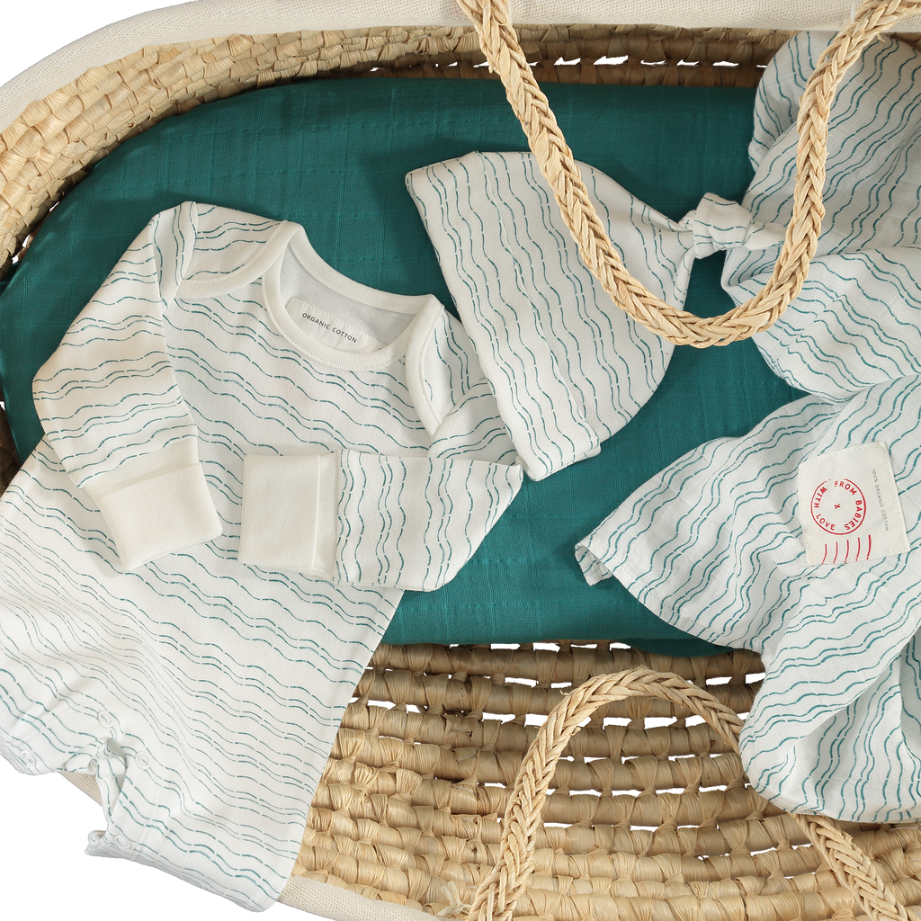 Send love and kindness with our Waves of Joy organic baby grow, a heartfelt and beautiful baby gift.