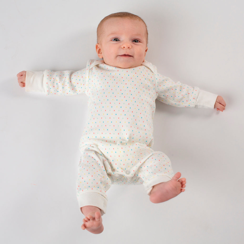 Gender Neutral and Unisex Organic Baby Grow With Multi-Coloured Kisses Design: Cute Baby Image