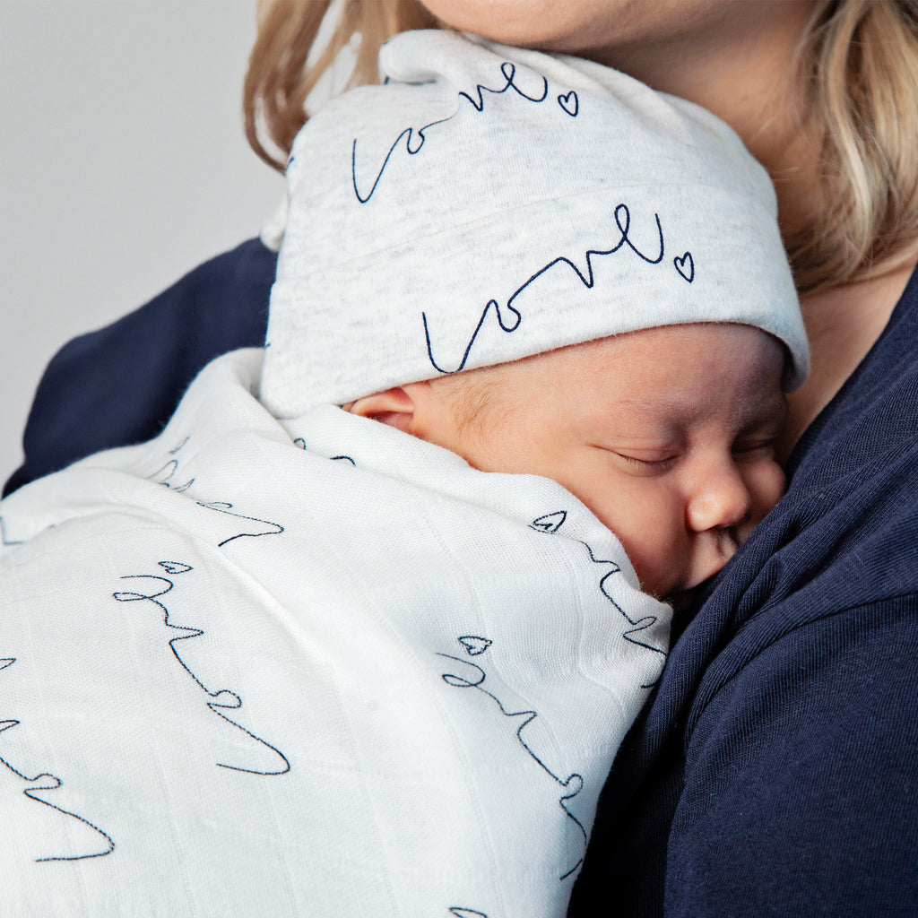 Lifestyle - Our Love baby knot hat is made with luxuriously soft organic cotton; give the gift of love!
